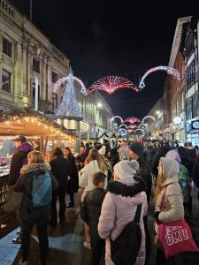 Christmas market stalls and visitors